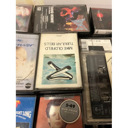 317 - Large selection of mixed cassettes to include David Bowie, John Denver & Tubular Bells etc.