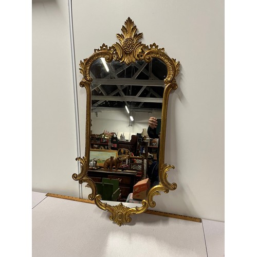 125A - Victorian ornate gilt framed carved wooden mirror. 
100cm x 48cm