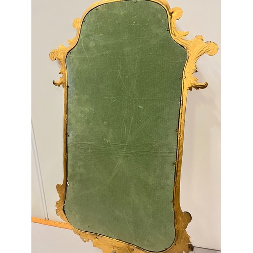 175B - Victorian ornate gilt framed carved wooden mirror. 
100cm x 48cm