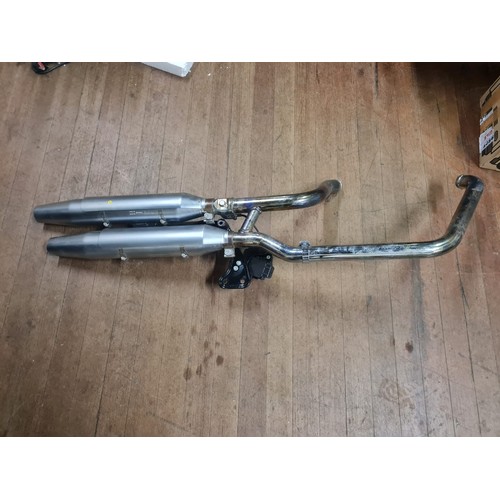 285 - Harley Davidson exhaust downpipe along with 2 silencers possibly suitable for Soft tail or Fat boy?