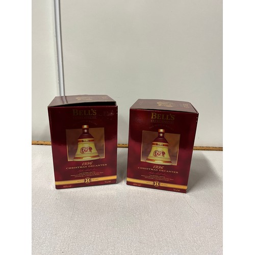 287 - 2 x Boxed full & sealed bells whisky decanters 70cl Christmas 2006