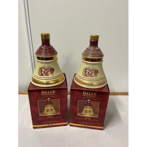 287 - 2 x Boxed full & sealed bells whisky decanters 70cl Christmas 2006