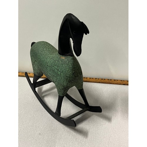 5 - Metal rocking horse 
30cm x 33cm