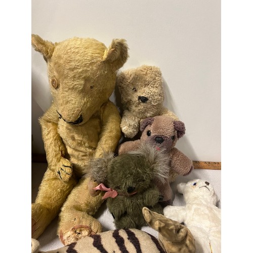 9 - Collection of vintage teddies to include Tebro bear & Merrythought horse etc.