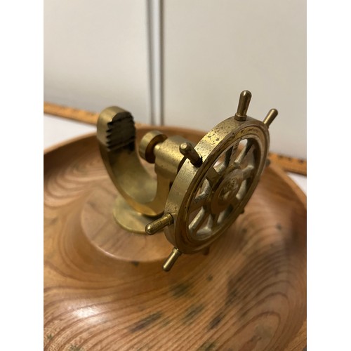 114 - 2 wood & brass ships wheel nutcrackers
Largest 26cm diameter.