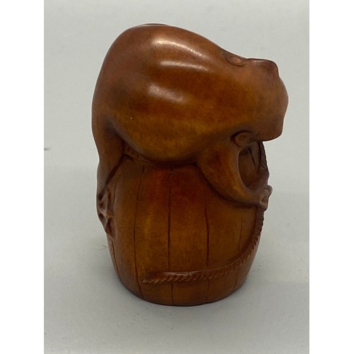 56 - Japanese root wood Netsuke of toad and mouse. Signed to base.