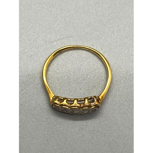 158 - 18ct gold and platinum ring set with diamonds. Size N