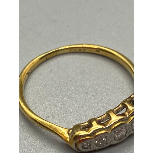 158 - 18ct gold and platinum ring set with diamonds. Size N