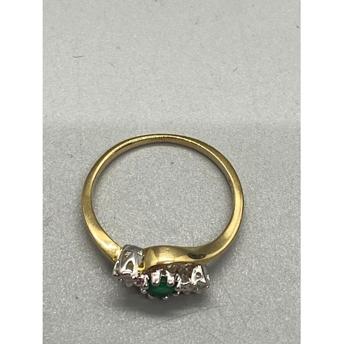 160 - 9ct gold ring set with emerald and diamonds.