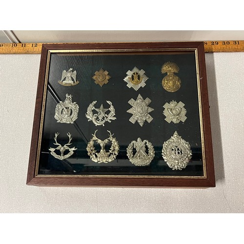 291 - collection of military badges in presentation box