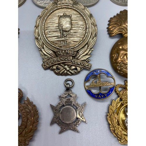 58D - Group WW1 cap badges, mine clearance service, RA X2 Royal engineers, RN silver fob medal WWII BWM X2... 