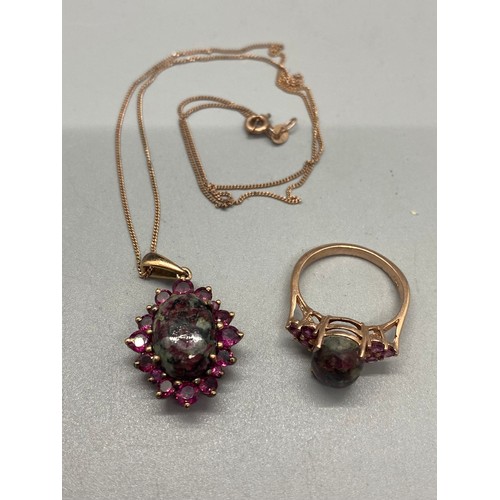 94 - Eudialyte, amethyst and silver pendant chain and ring.