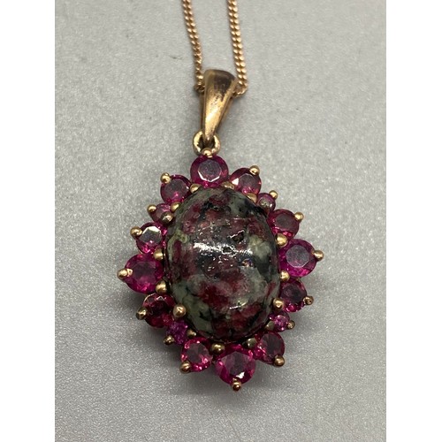 94 - Eudialyte, amethyst and silver pendant chain and ring.