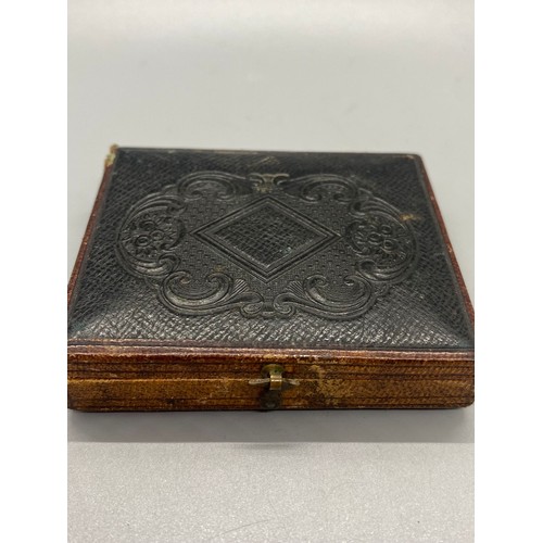 188B - Victorian tin type photo of seated woman in velvet book frame.