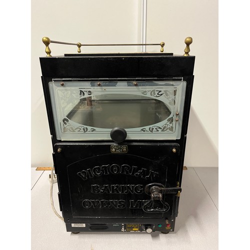 66 - Victorian baking ovens Ltd potato oven with heated ceramic tile top.  working.
70cm h x 41cm w