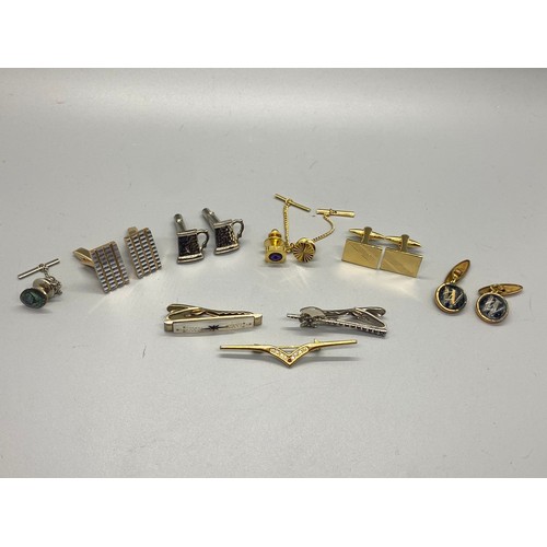 489 - Selection of vintage cufflinks and tie pins.