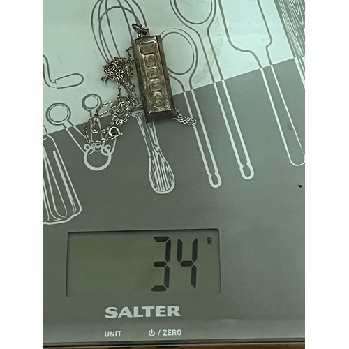 8 - large heavy silver ingot on silver chain
34 grams