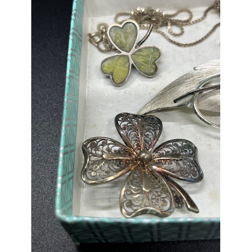 11 - selection of silver brooches