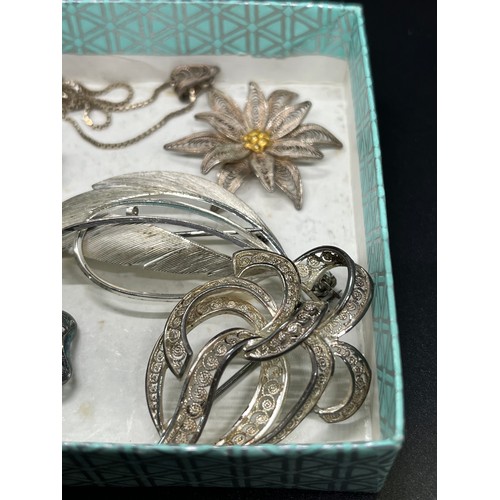 11 - selection of silver brooches