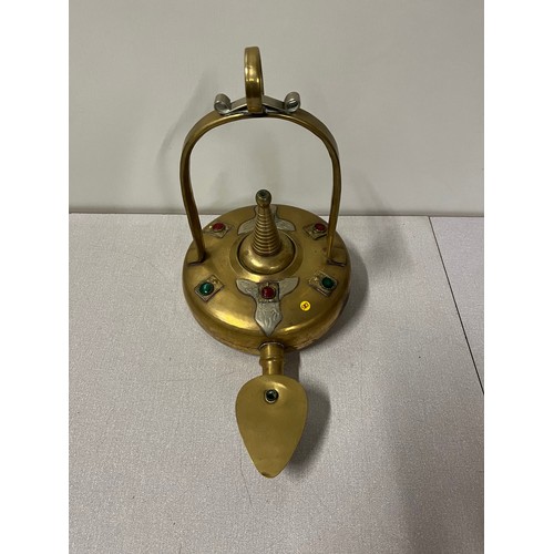 21 - antique middle eastern brass oil lamp with coloured glass stones & possibly silver decoration
33cm l... 