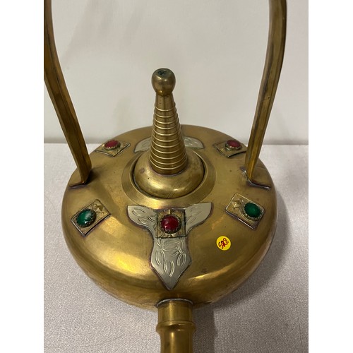 21 - antique middle eastern brass oil lamp with coloured glass stones & possibly silver decoration
33cm l... 