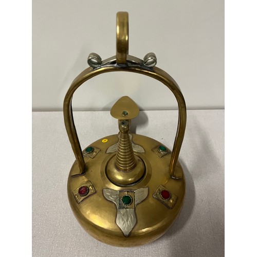 21 - antique middle eastern brass oil lamp with coloured glass stones & possibly silver decoration
33cm l... 