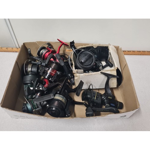 435 - box of fishing reels