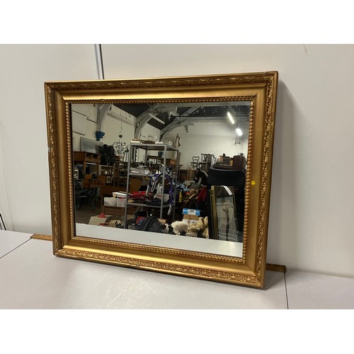 240 - Large gilt framed mirror.
68cm x 58cm