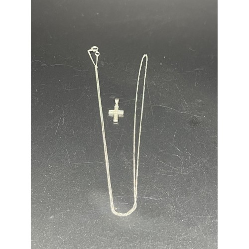 247 - 9ct white gold & diamond cross pendant with 9ct white gold chain.