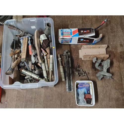 297 - Box of tools to include large metal rawl plugs etc