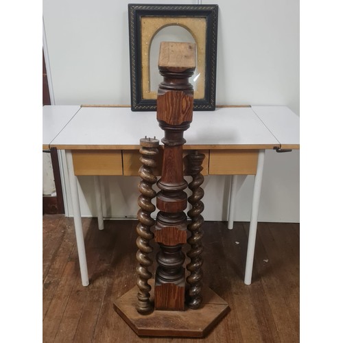 122 - Antique picture frame along with wooden barley twist columns.