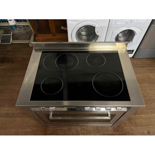 217 - Stainless steel Ariston range 4 ring induction hob electric cooker. working.
90cm w x 60cm d x 96cm ... 