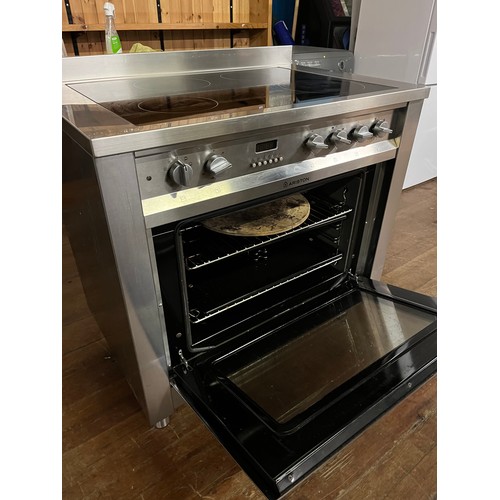 217 - Stainless steel Ariston range 4 ring induction hob electric cooker. working.
90cm w x 60cm d x 96cm ... 