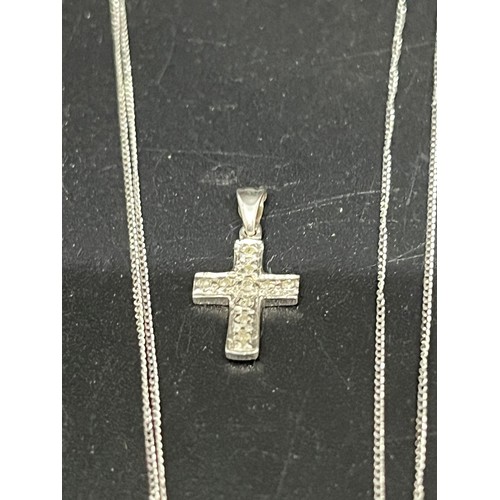 247 - 9ct white gold & diamond cross pendant with 9ct white gold chain.