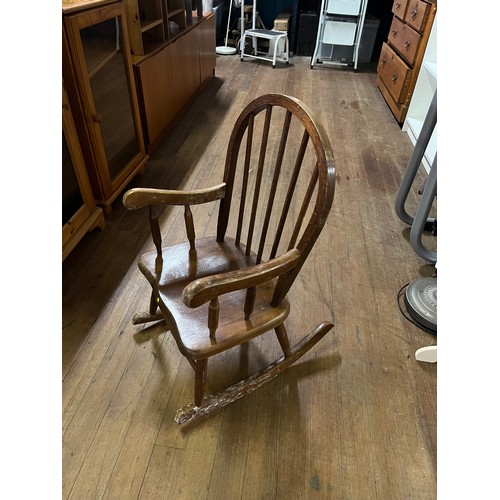 41 - Vintage child's Windsor style rocking chair bearing label for Ruddiman.