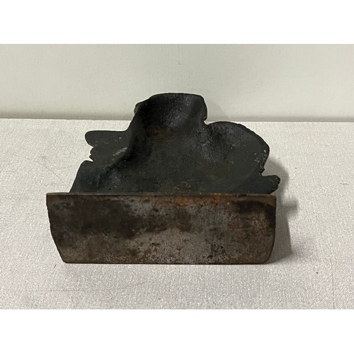 130 - Antique heavy steel/cast iron door stop.
22cm h