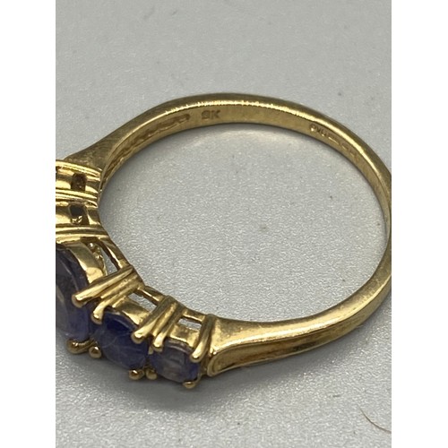 2 - 9ct yellow gold and amethyst 5 stone ring.