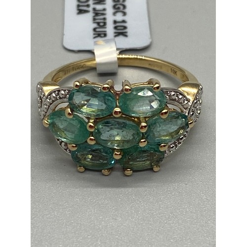 8 - 10k yellow gold and Peridot art deco cluster ring.