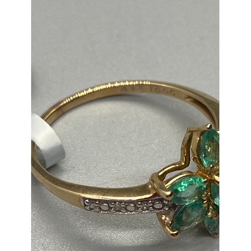 9 - 10k yellow gold and Peridot flower ring.