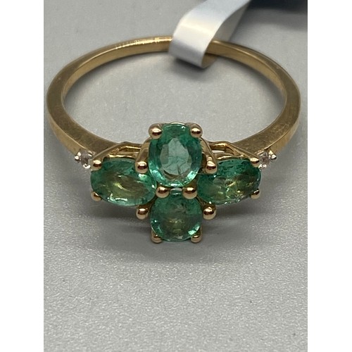 10 - 10k yellow gold and Peridot 4 stone ring.