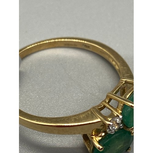 13 - 10k yellow gold and Peridot and white stone ring.