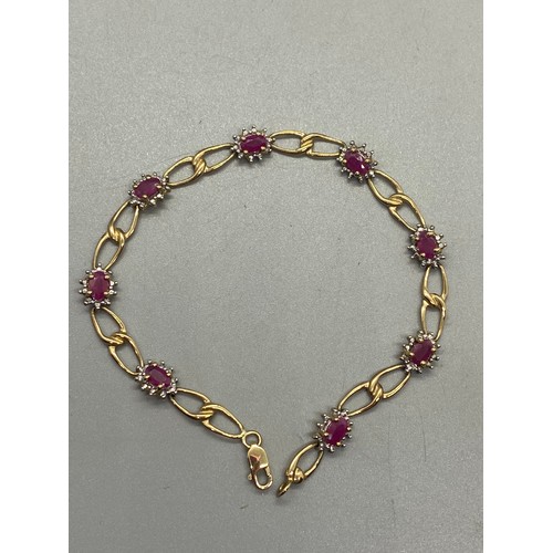 106 - 9ct yellow gold, diamond and ruby bracelet together with matching 9ct gold, diamond and ruby stone p... 