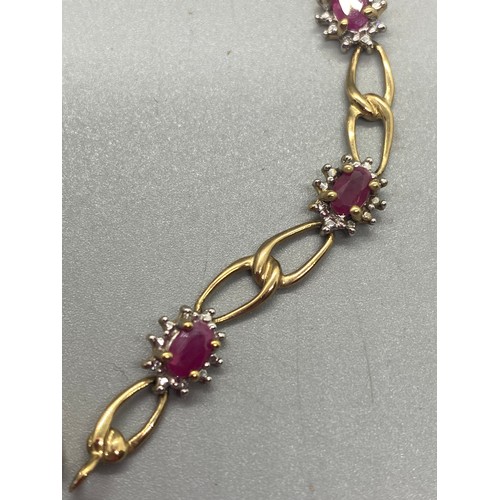 106 - 9ct yellow gold, diamond and ruby bracelet together with matching 9ct gold, diamond and ruby stone p... 