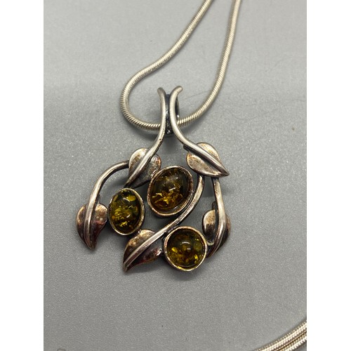 107 - 3 silver and Baltic amber necklaces 1 signed PS.