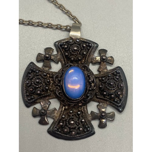 108 - Silver Bethlehem crusader cross pendant fitted with an oval cut moonstone along with filigree silver... 