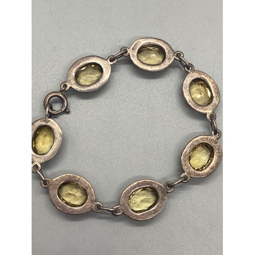 111 - Sterling silver and citrine stone bracelet.