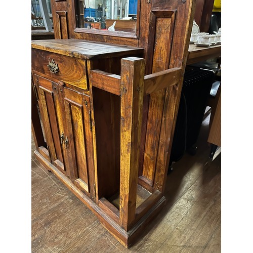 73 - Large solid Mexican pine hall stand to include 2 door storage cabinet & umbrella stand. 
(194x88x30c... 