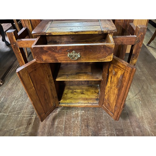 73 - Large solid Mexican pine hall stand to include 2 door storage cabinet & umbrella stand. 
(194x88x30c... 