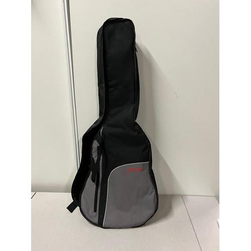 210 - Martin Smith acoustic guitar & soft case.