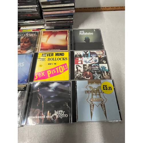 371 - Large selection of CD's to include U2, The Clash, Madonna, Sex Pistols etc.